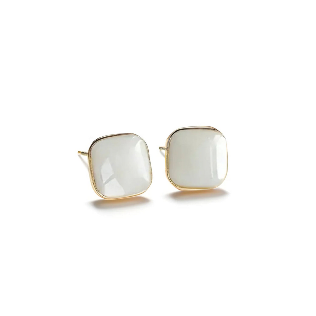 Bordeaux Enamel Earrings shown from side angle highlighting red enamel and gold detail on white background