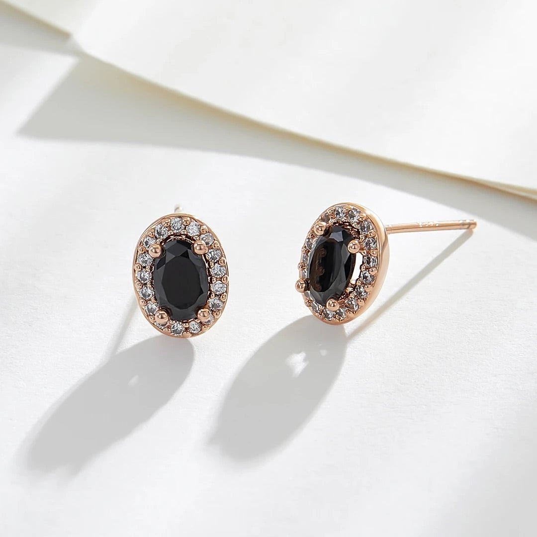 Gemstone Earrings shown from side angle highlighting gold setting and gemstones
