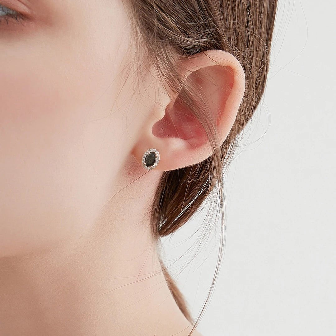 Gemstone Earrings styled on model with casual outfit