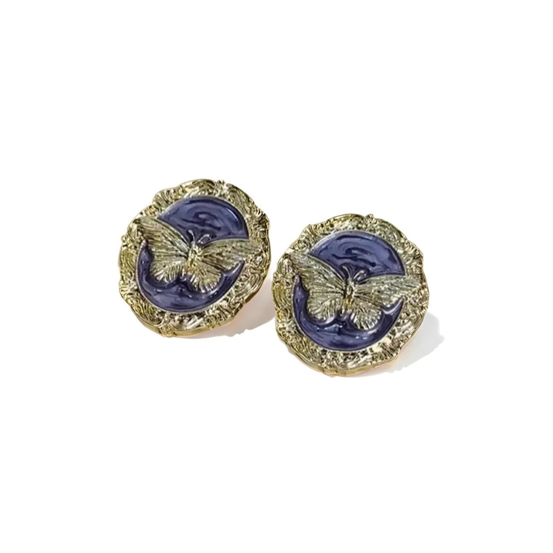 Gold Earrings with polished hoop design on white background
