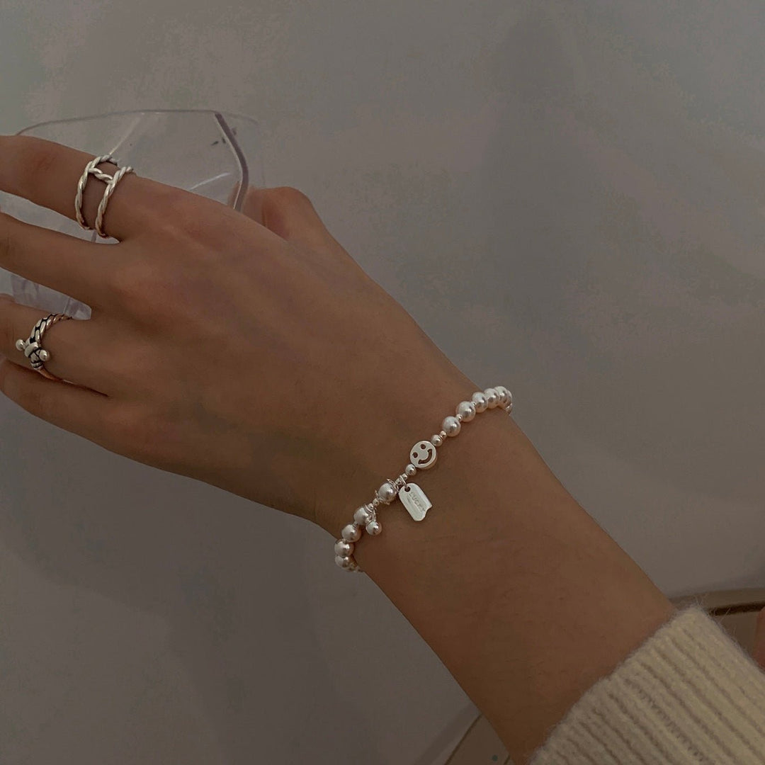 Lucky Beads Bracelet styled on model with layered casual accessories
