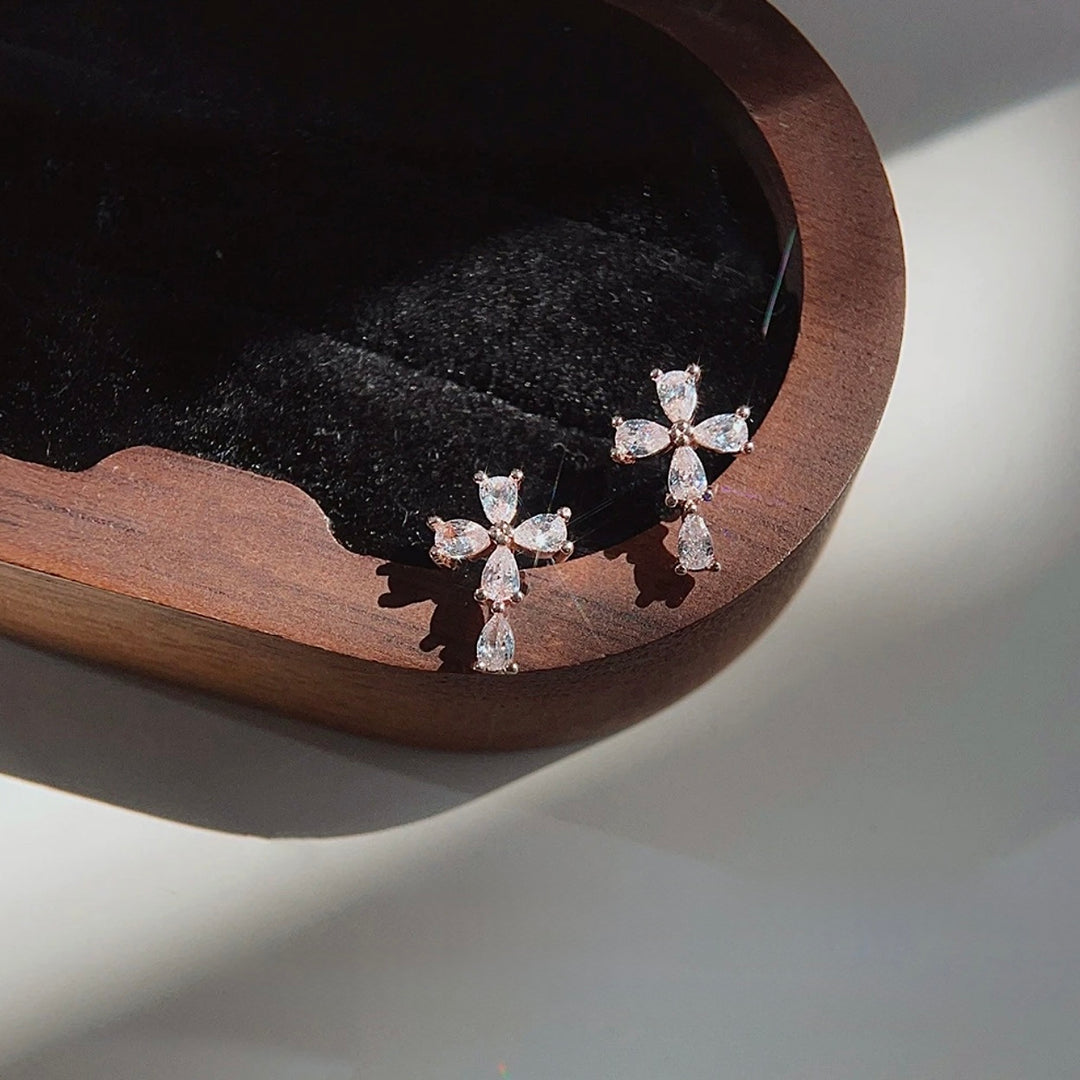 Mini cross stud earrings for women in minimalist style