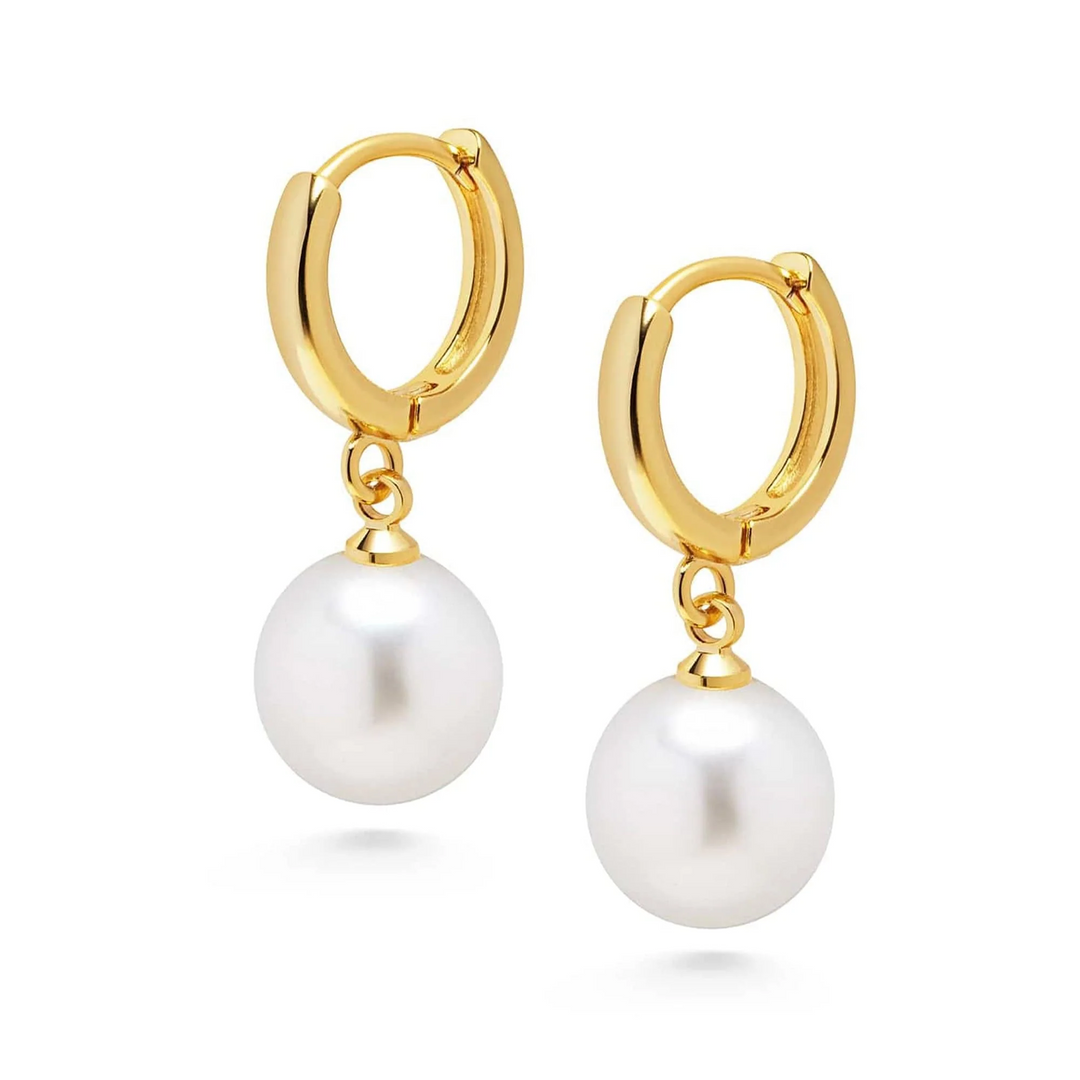 Close-up detail of Pearl Drop Earrings showing lustrous pearls and gold finish on white background
