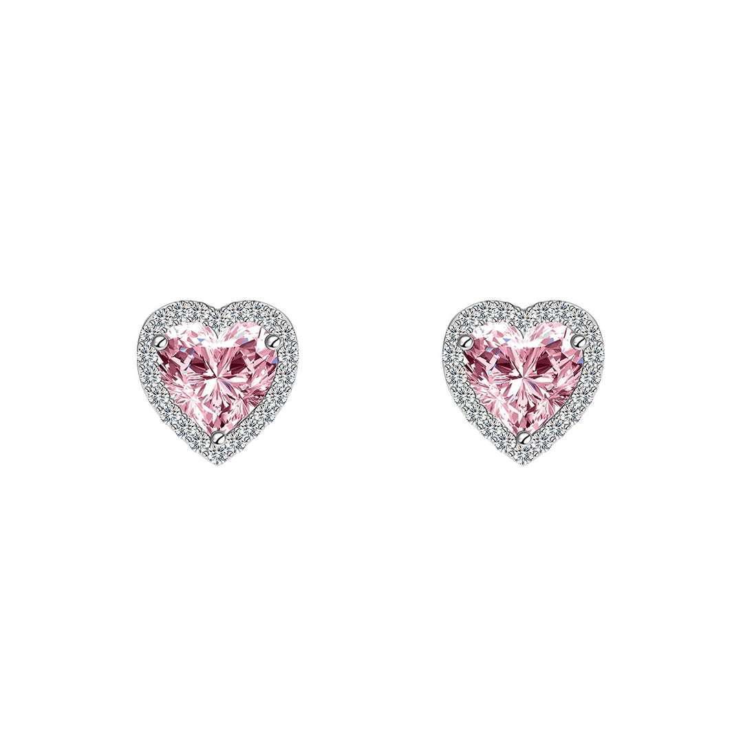 Heart-shaped pink gemstone earrings with silver surround on a white background