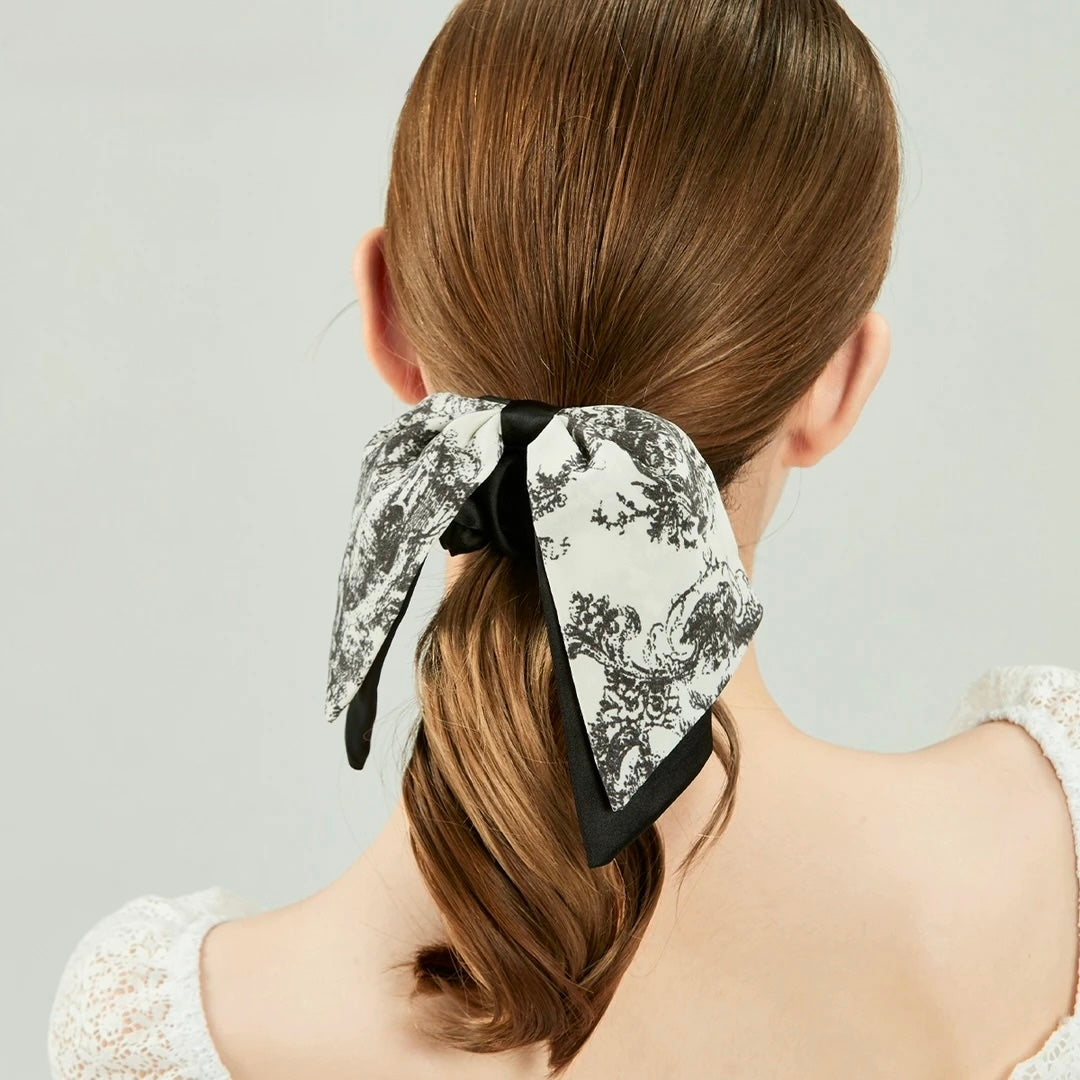 Vintage Scarf Bow Scrunchie close-up worn by model showing long bow detail