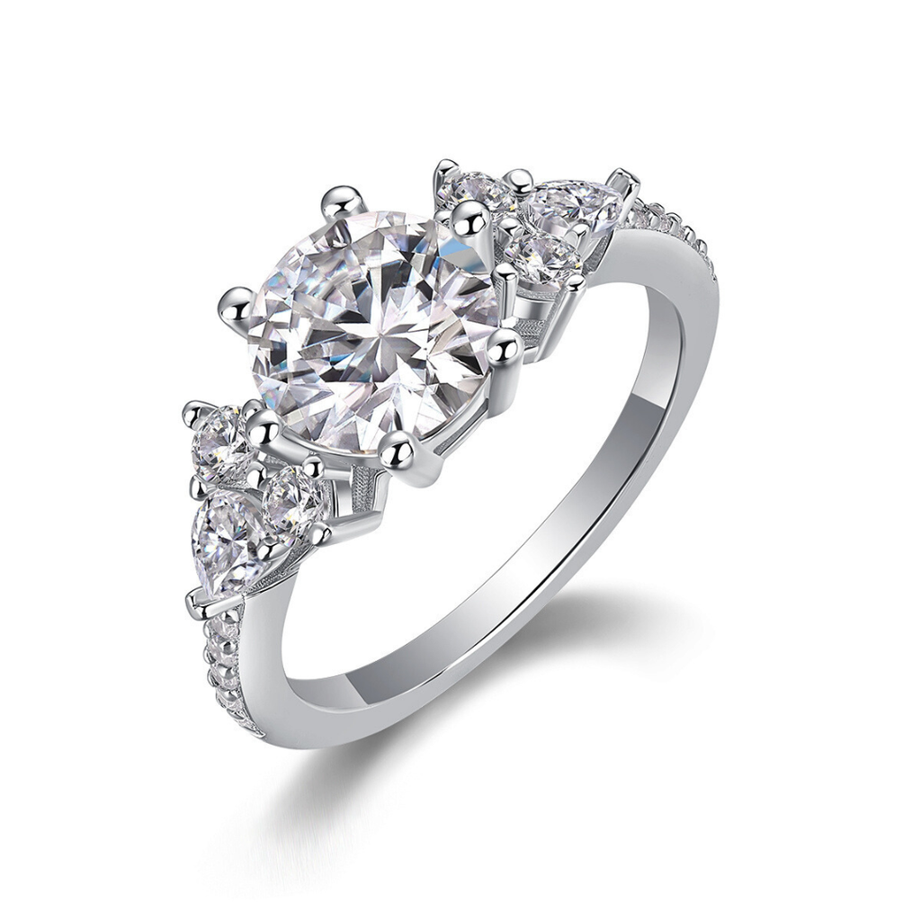 Round Brilliant Moissanite Three-Stone Ring