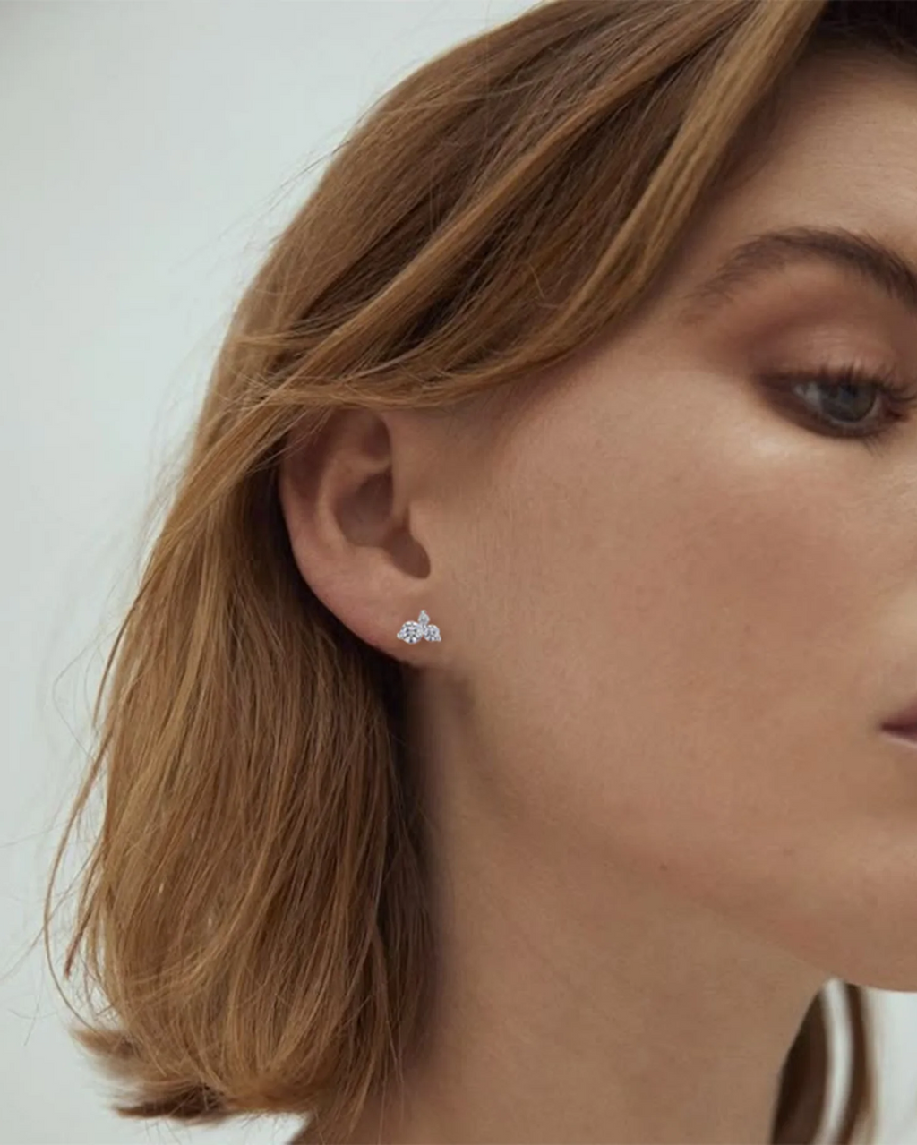 Wave-Set Round Moissanite Stud Earrings