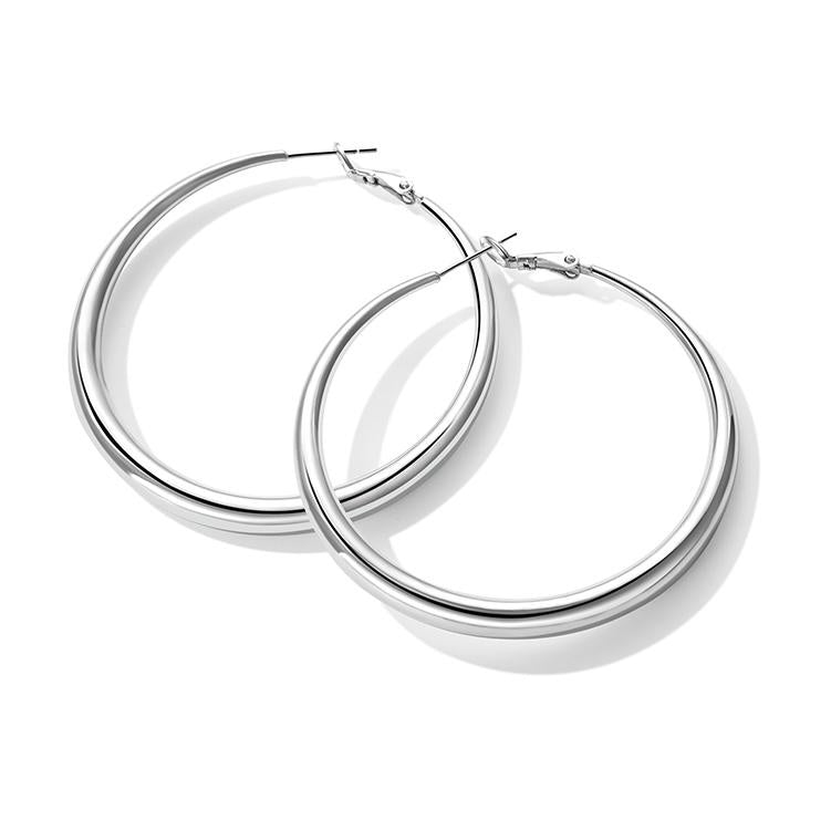 Pair of silver hoop earrings on a white background