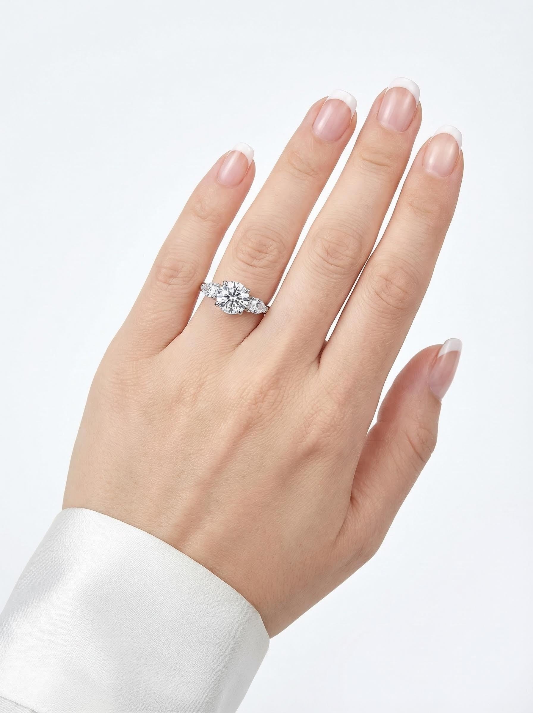 Round Moissanite Three-Stone Ring