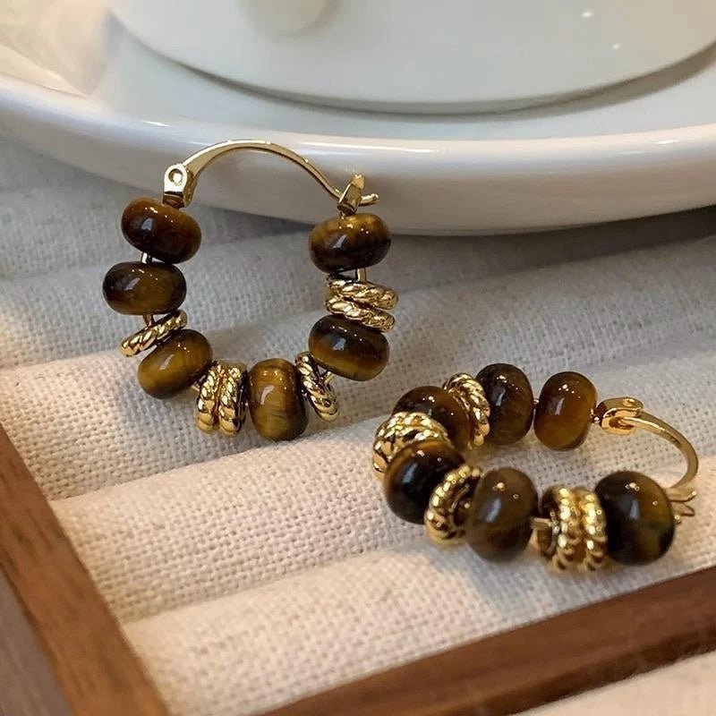 Close-up detail of Beaded Hoop Earrings showing bead accents and gold hoop texture