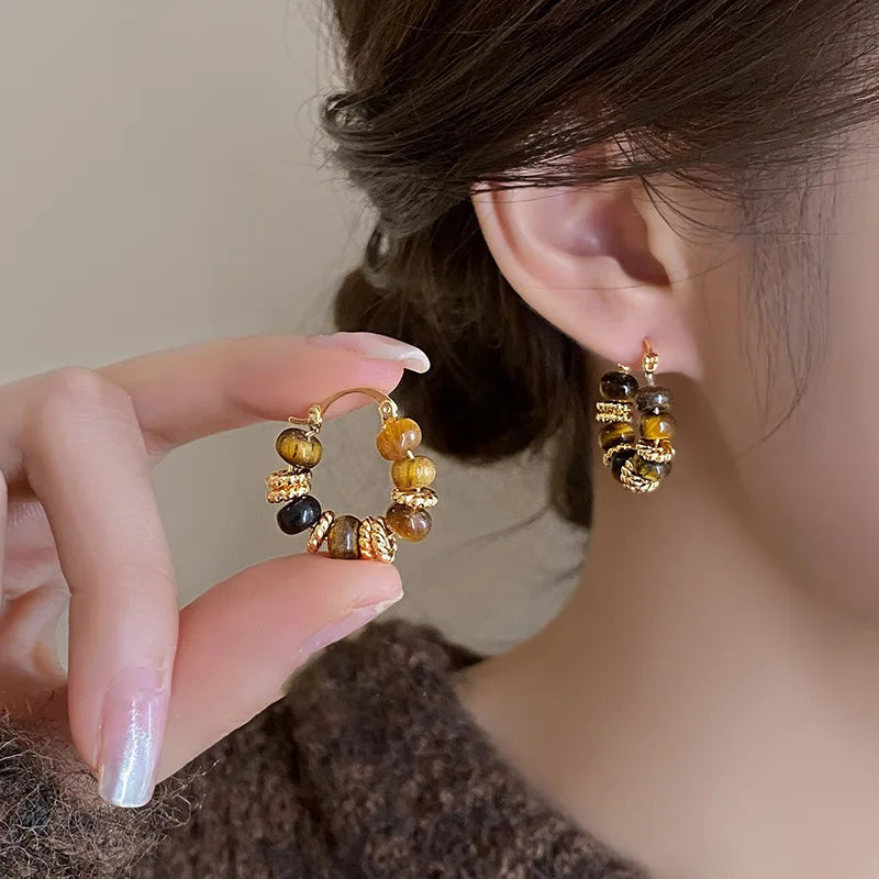 Beaded Hoop Earrings worn by model showcasing gold hoops with beaded detail