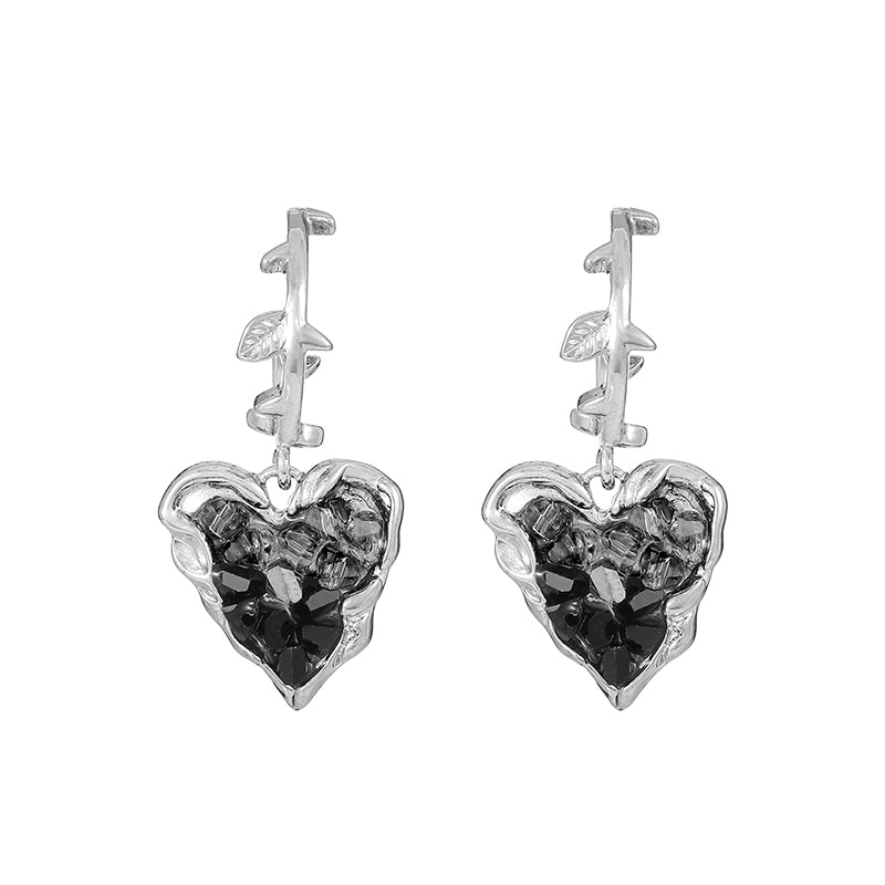 Black crystal heart earrings with silver-tone vine design
