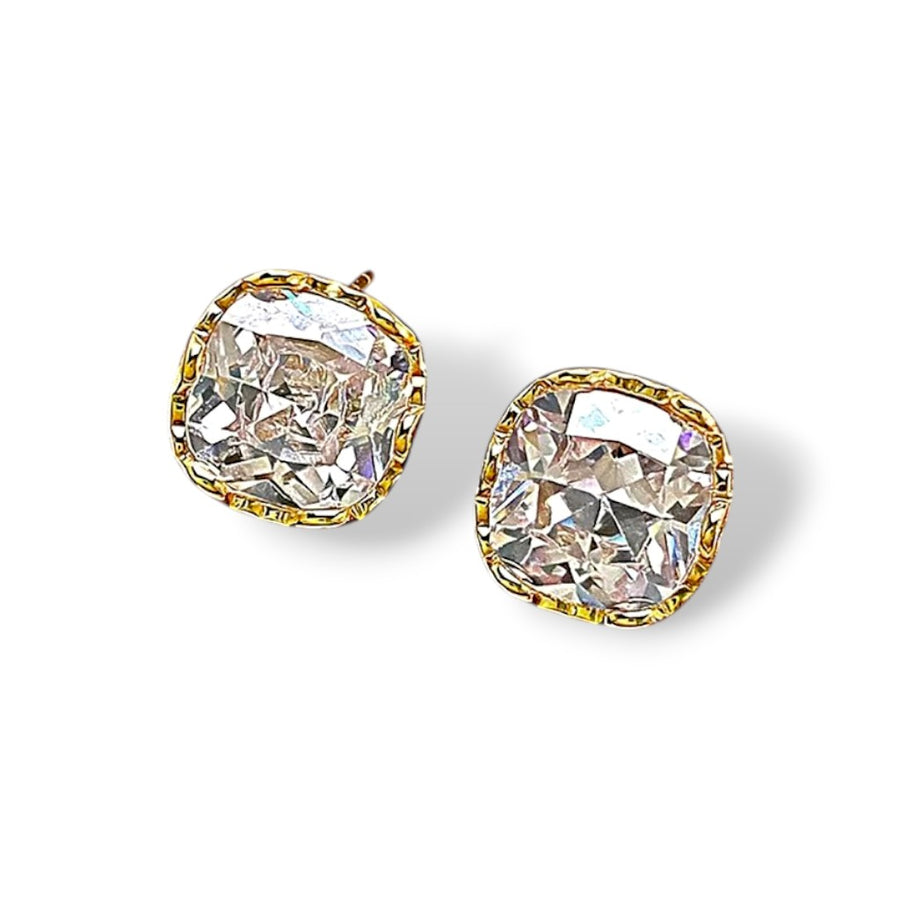Faceted cushion cut stud earrings with gold tone setting
