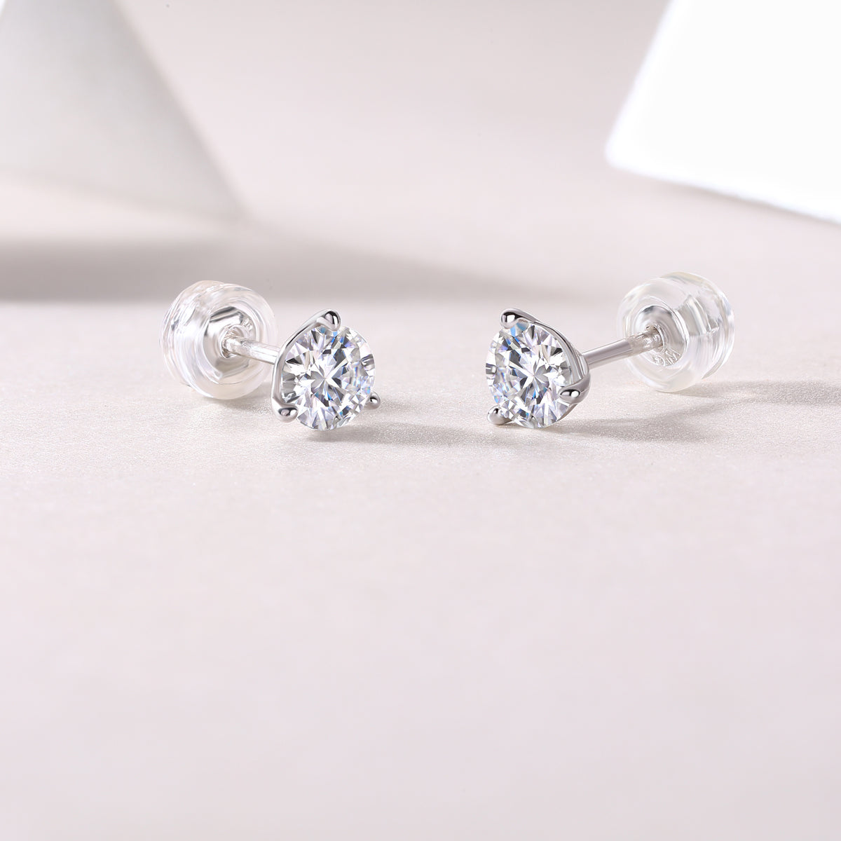 Minimal Four-Prong Round Moissanite Stud Earrings