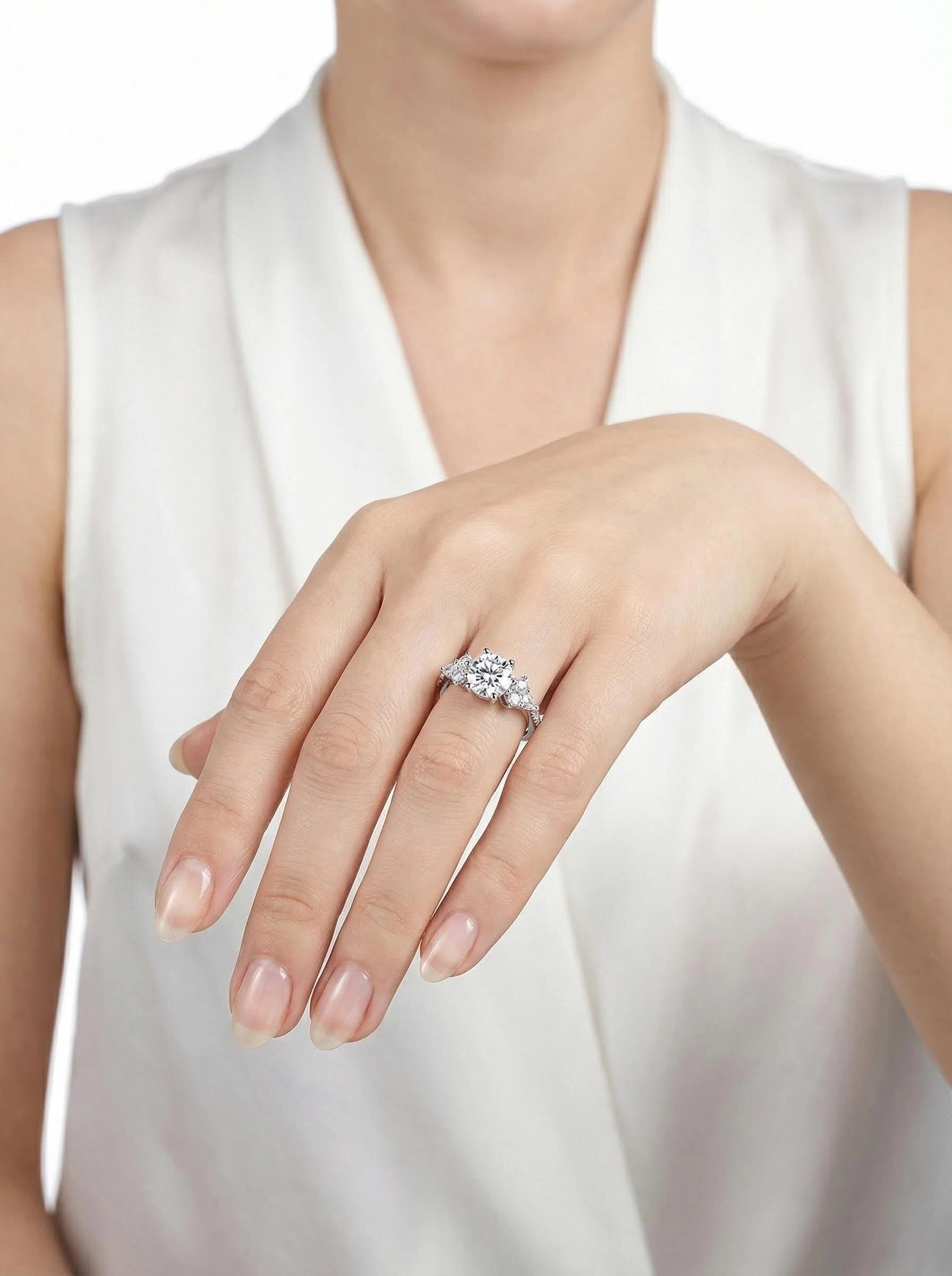 Round Brilliant Moissanite Three-Stone Ring