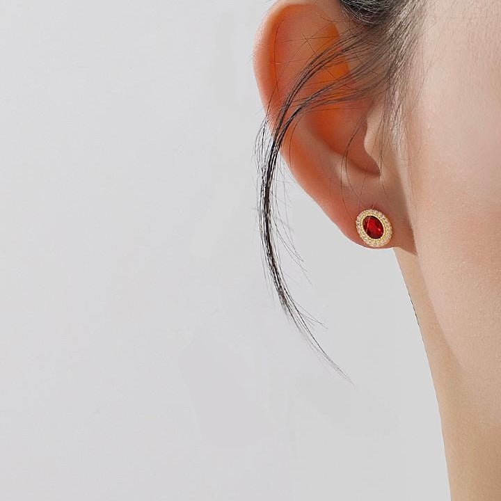 Gemstone Earrings close-up worn by model showing colorful gemstone details
