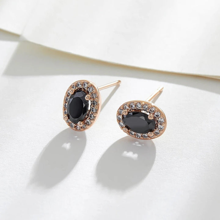 Close-up detail of Gemstone Earrings showing colorful gemstones and gold finish
