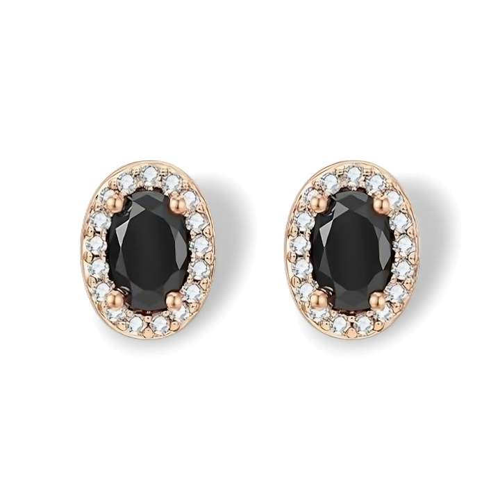 Gemstone Earrings with gold-tone setting and colorful gemstones on white background
