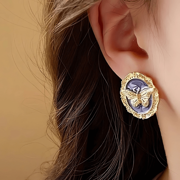 Gold Earrings worn by model showing classic hoop style and fit