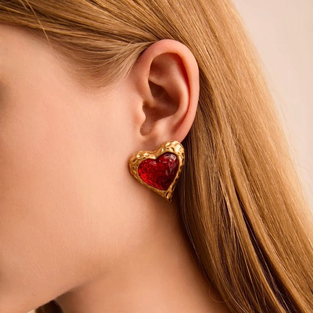 Heart Earrings worn by model showcasing gold heart design and fit
