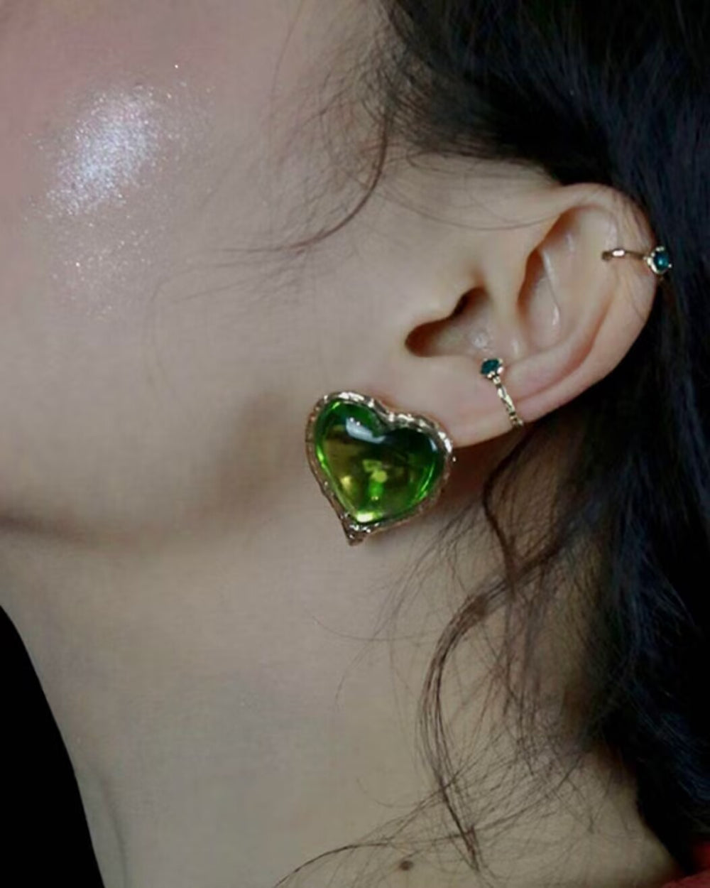Heart Earrings worn by model showcasing gold heart design and fit
