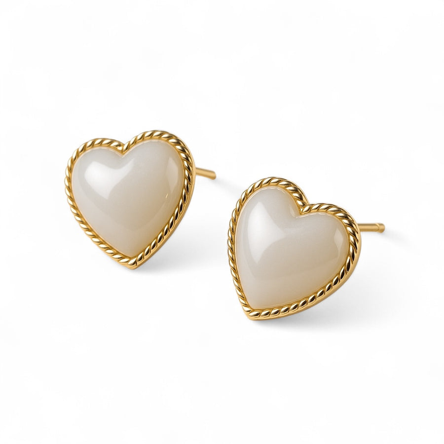 HeartGlow Stud Earrings with gold-tone heart design on white background
