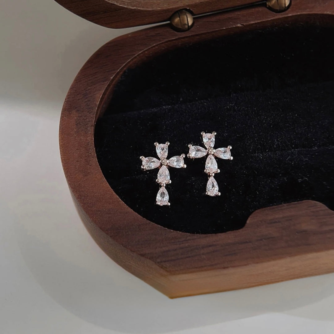 Mini cross stud earrings for women in minimalist style
