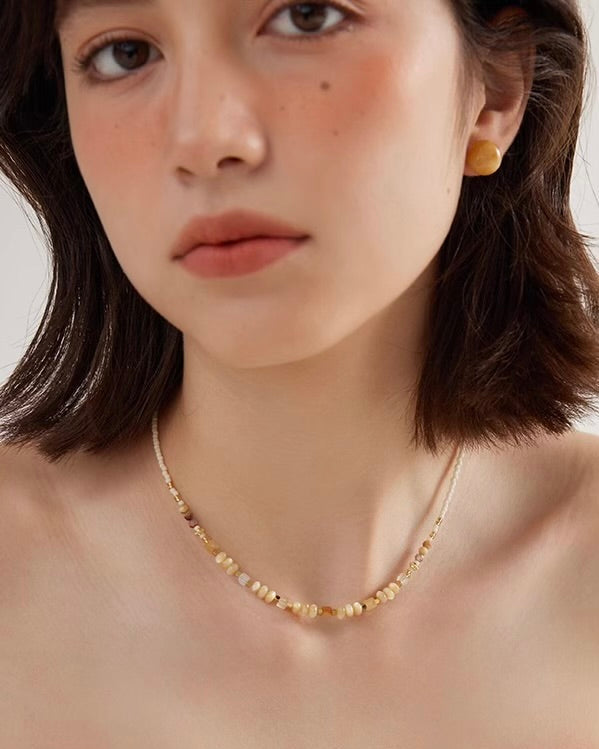 Natural Bead Necklace Set close-up showing layered beaded strands worn by model