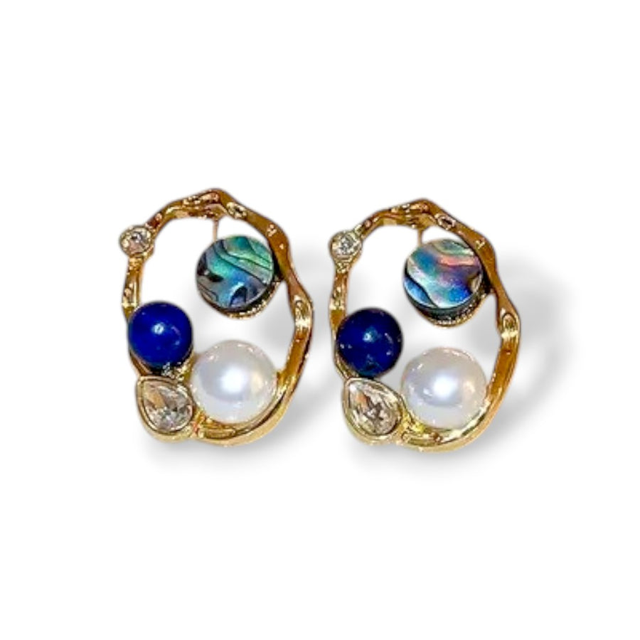 Ocean Muse Stud Earrings with shell-inspired design on white background