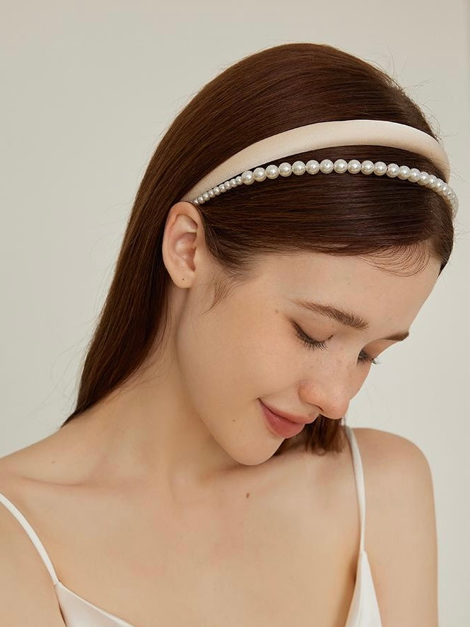 Pearl Headband shown on model from alternate angle highlighting pearls