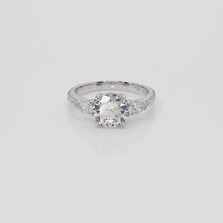 Round Moissanite Three-Stone Ring
