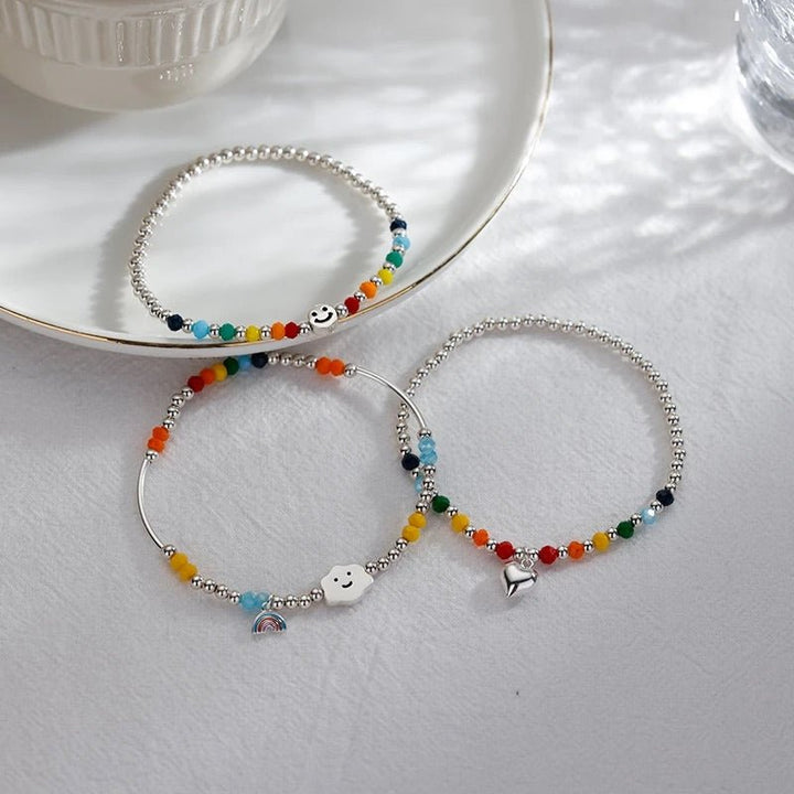Rainbow Bracelet worn by model in relaxed lifestyle setting