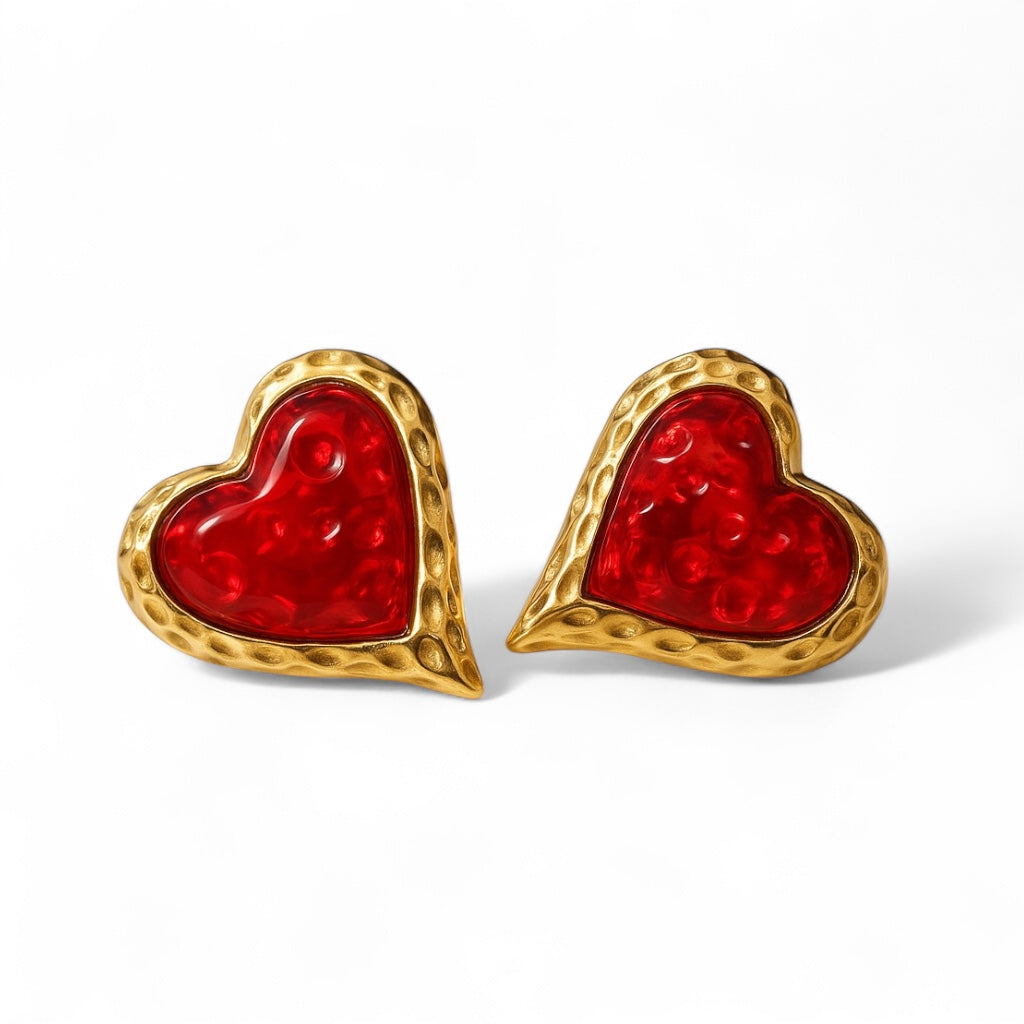 Heart Earrings with gold-tone heart design on white background
