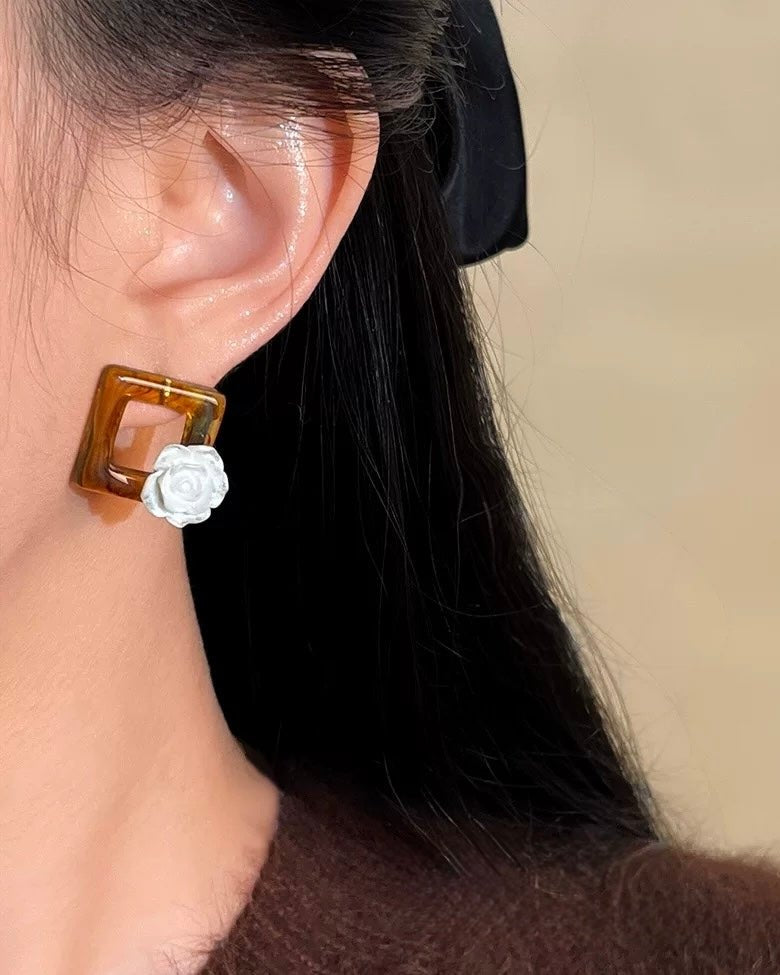 Square Bloom Earrings worn by model showing gold floral detail