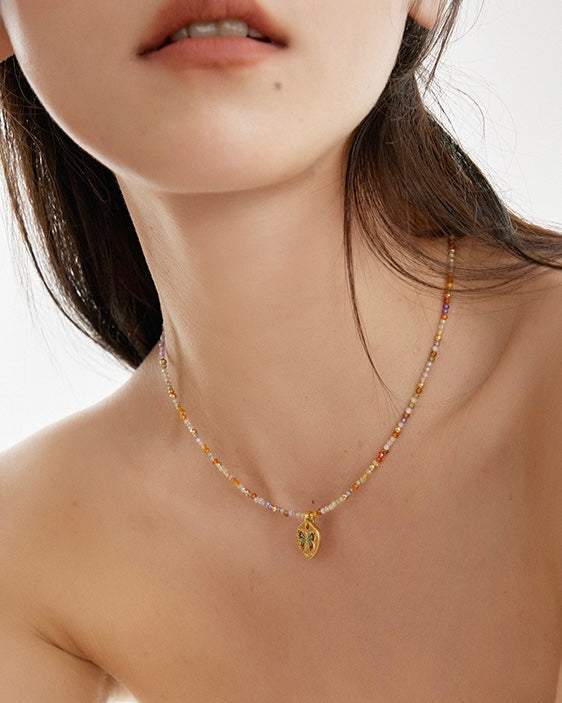 Starlit Charm Necklace worn by model with layered look and outfit styling