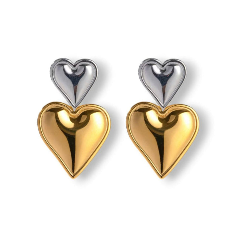 Two-Tone Heart Earrings with gold and silver heart design on white background
