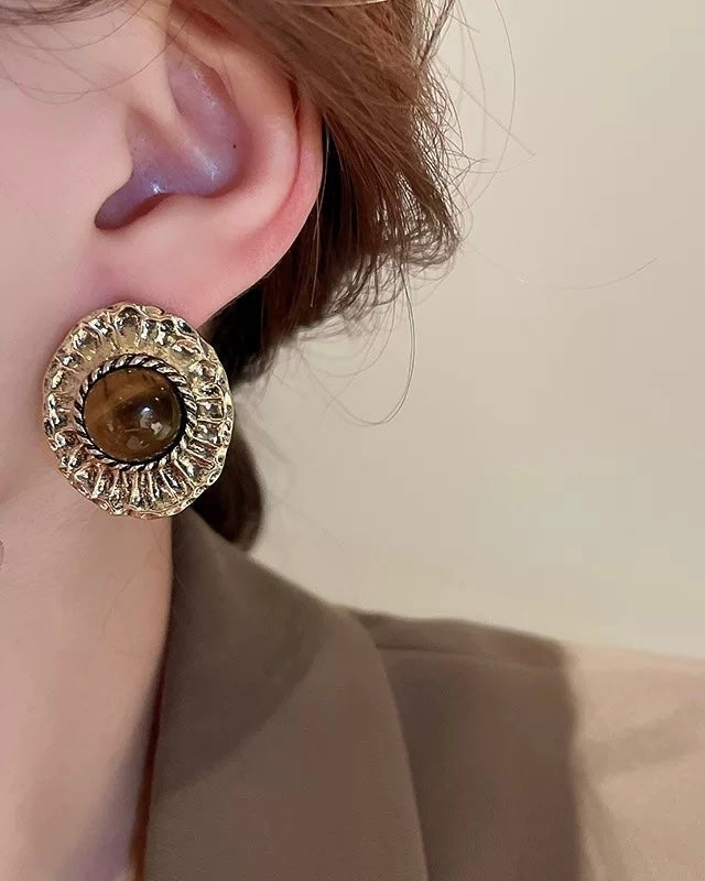 Vintage Earrings worn by model showing classic gold design and fit
