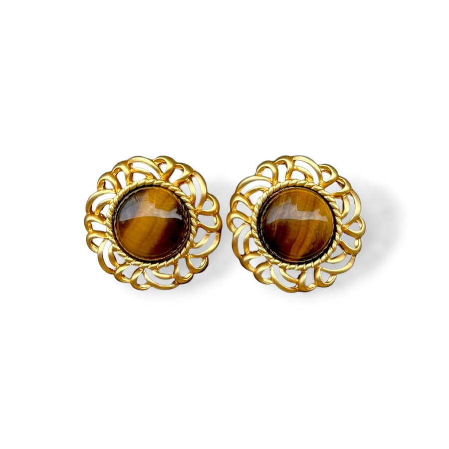 Elysian Earrings with sculpted gold-tone design on white background

