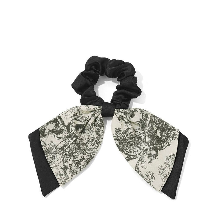 Vintage Scarf Bow Scrunchie on white background showing side angle of bow detail